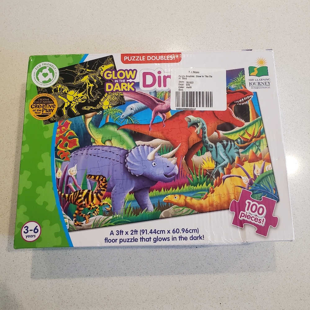 New. Glow in the Dark Dinosaur 100 piece puzzle